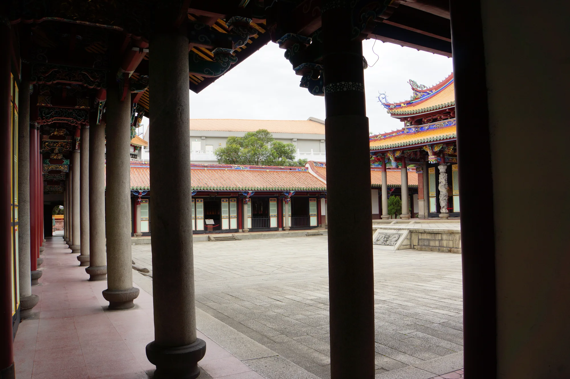 The inner courtyard and colorful tiled-roof halls of the Taipei Confucius Temple