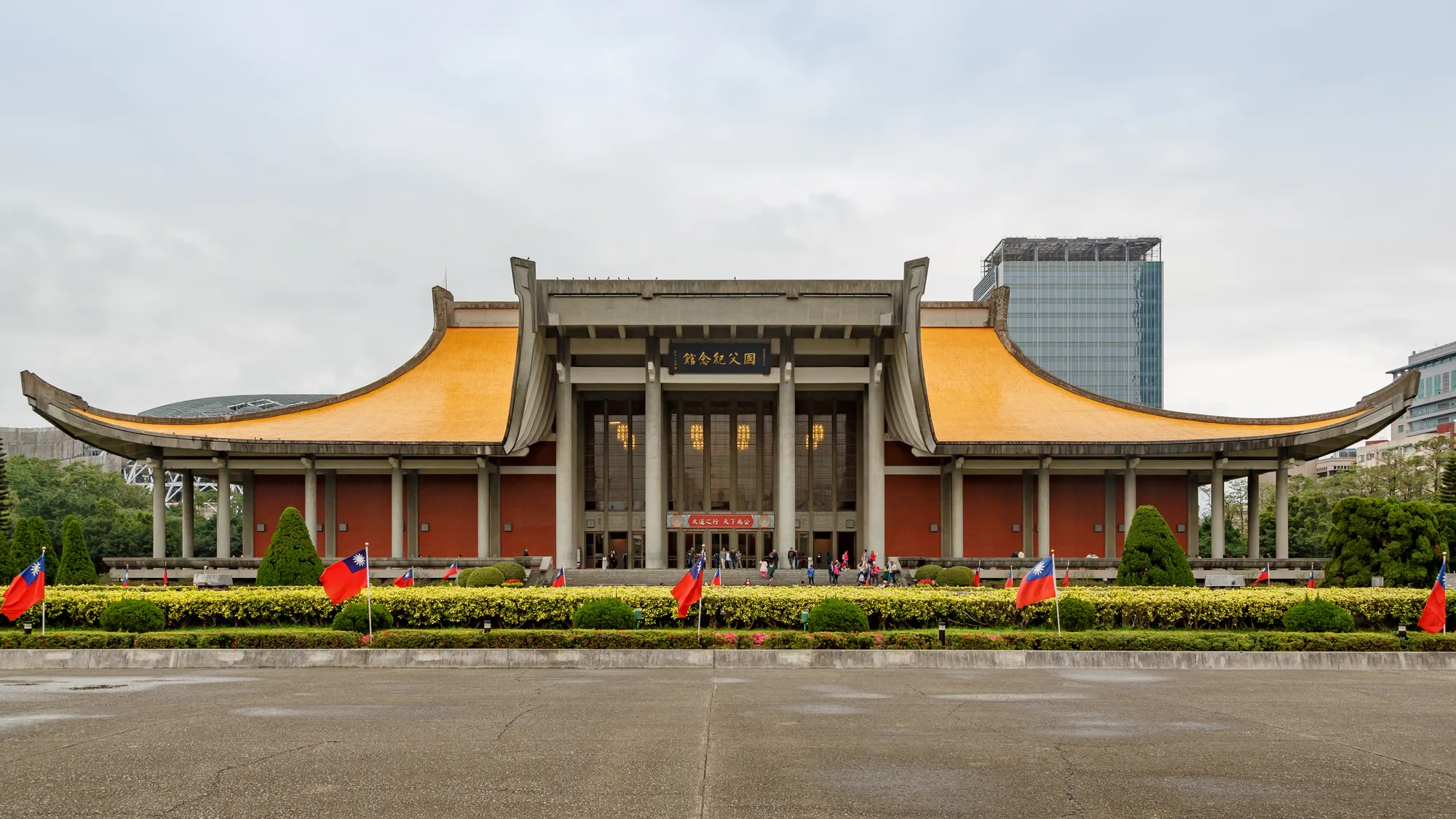 The Sun Yat-sen Memorial Hall in Taipei with its sweeping upturned yellow curved roof and red columns